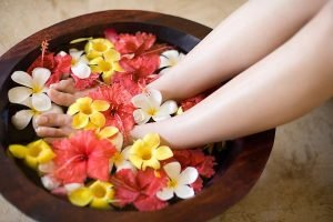 soak your feet before massage to help your legs slim, firm